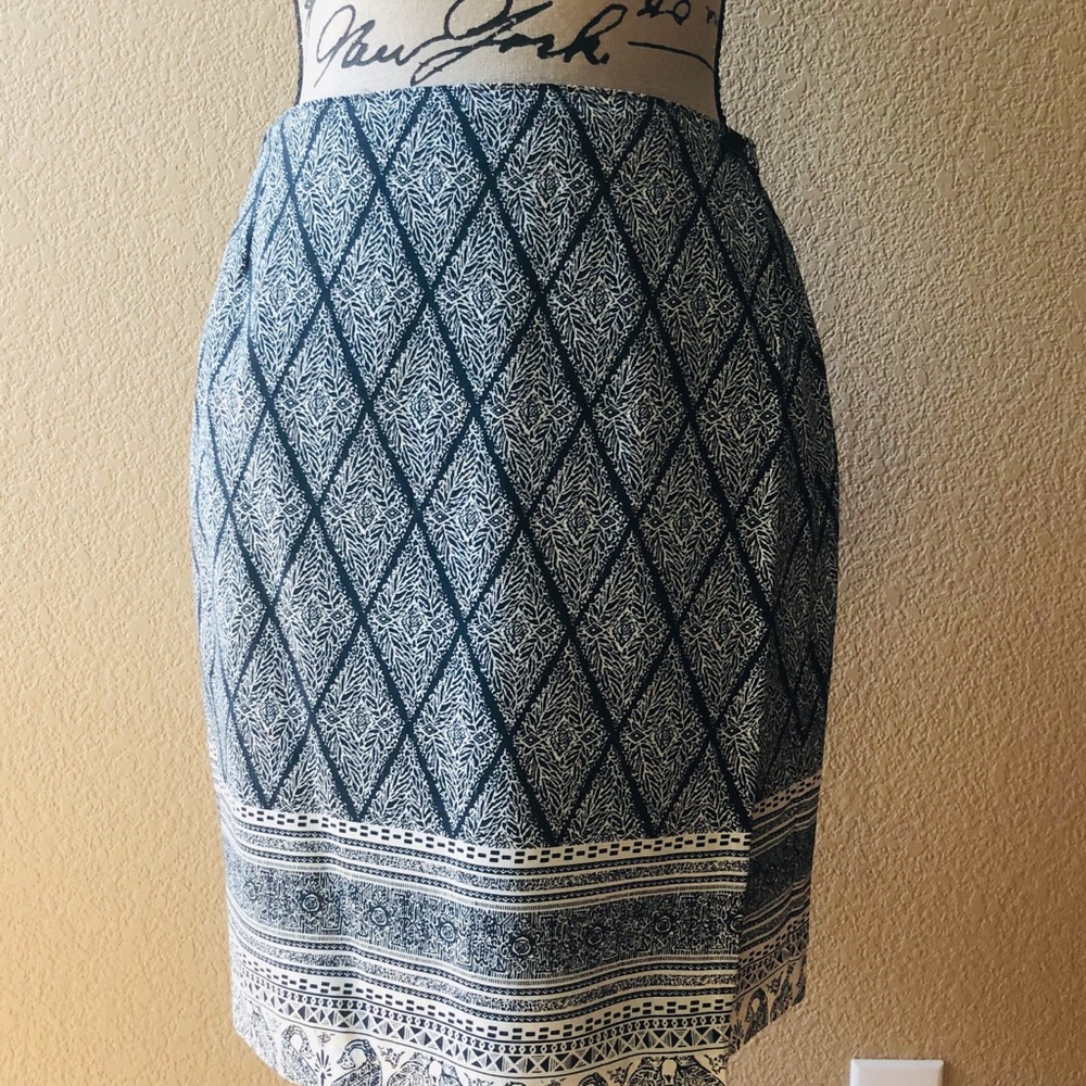 L’Amadei Navy and cream colored skirt.